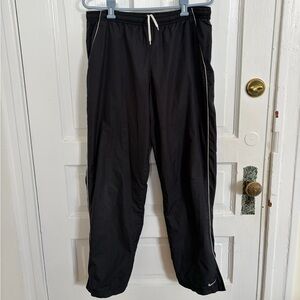 Navy blue Nike swish track pants